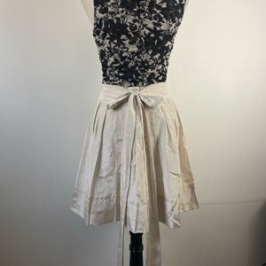 Chic Cream A-Line Skirt with Bow Accent